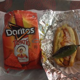 a bag of doritos and a hot dog a bag of doritos and a hot dog