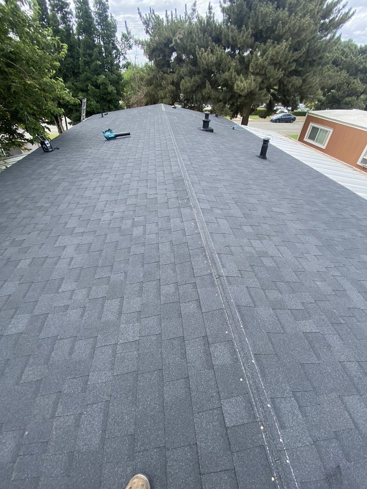 Slide of ARG Roofing Services