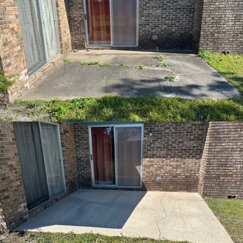 Landells Exterior Solutions - Before and after of washing concrete pad - Lawn Services Near Me - Callaway, Florida Landells Exterior Solutions - Before and after of washing concrete pad - Lawn Services Near Me - Callaway, Florida