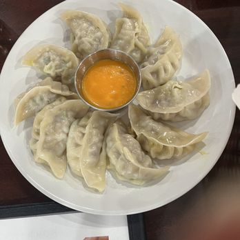 Karki Restaurant & Bar - Chicken Momo (Steam) - Himalayan/Nepalese Near Me - Grand Rapids, Michigan Karki Restaurant & Bar - Chicken Momo (Steam) - Himalayan/Nepalese Near Me - Grand Rapids, Michigan
