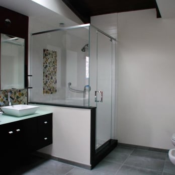 Glassolutions - Corner glass shower enclosure with ultra clear starphire glass, frameless style header, and glass to glass seams for a clean ... - Glass & Mirrors Near Me - Newburgh, New York Glassolutions - Corner glass shower enclosure with ultra clear starphire glass, frameless style header, and glass to glass seams for a clean ... - Glass & Mirrors Near Me - Newburgh, New York