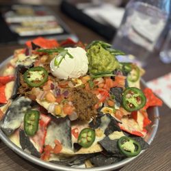 Tom's Watch Bar - Deep Dish Nachos-a favorite at Tom's
