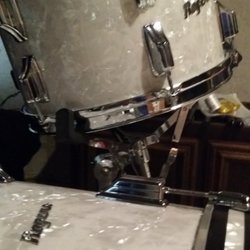 Bill Cairo's Drum House - 71 Rogers re-wrap project- Bill helped me replace missing parts he had around his store.He was able to supply rims, tension rods, and heads.