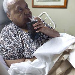 Westbury Health & Rehabilitation Center of McDonough - Mom Holding An Drinking Juice On Her Own