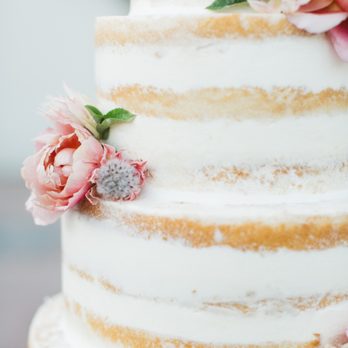 Exquisite Desserts - Naked Wedding Cake - Vanilla Butter Cake with Italian Meringue Buttercream Filling. Florals by Plenty of Petals. - Bakeries Near Me - Palm Desert, California Exquisite Desserts - Naked Wedding Cake - Vanilla Butter Cake with Italian Meringue Buttercream Filling. Florals by Plenty of Petals. - Bakeries Near Me - Palm Desert, California
