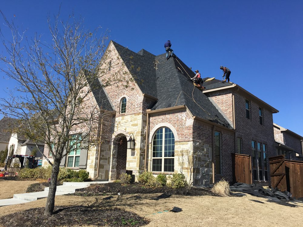 Slide of DNA Roofing & Construction