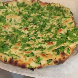 Spicy naan with shaved jalapeño Spicy naan with shaved jalapeño