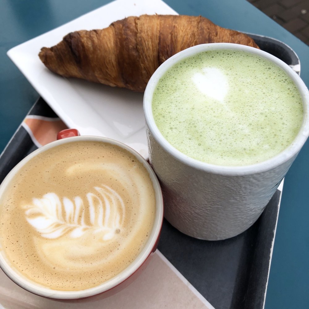 Cappuccino, Matcha Coconut Latte and a Croissant Cappuccino, Matcha Coconut Latte and a Croissant