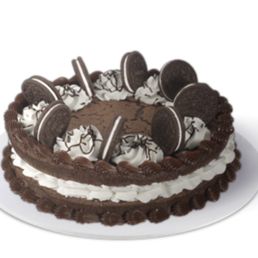 a chocolate cake with oreo cookies on top