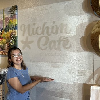 Nichim Coffee Cafe & Boutique - Magical wall art appeared!  Maybe they can offer 10% off when it shows up?? Haha!! Or maybe we could tip 10% more? - Coffee & Tea Near Me - Yuma, Arizona