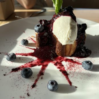 Nell Thorn Restaurant & Pub - Basque cheesecake with lemon blueberry compote. - New American Near Me - La Conner, Washington