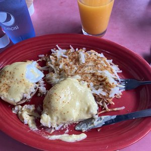 Photo of The Madison Diner - Bainbridge Island, WA, United States. Crab Benedict. It came with the hashbrowns.  And a glass of freshly squeezed orange juice.