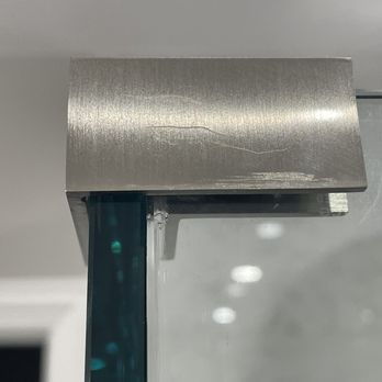 Creative Mirror & Shower - They installed a damaged piece of hardware and hoped we wouldn't notice. - Glass & Mirrors Near Me - Addison, Illinois
