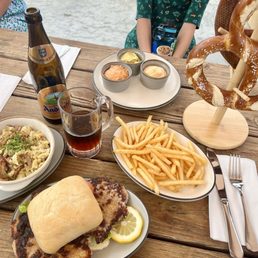 Kase spatzle, schnitzel w/ bun, giant pretzel, fries Kase spatzle, schnitzel w/ bun, giant pretzel, fries