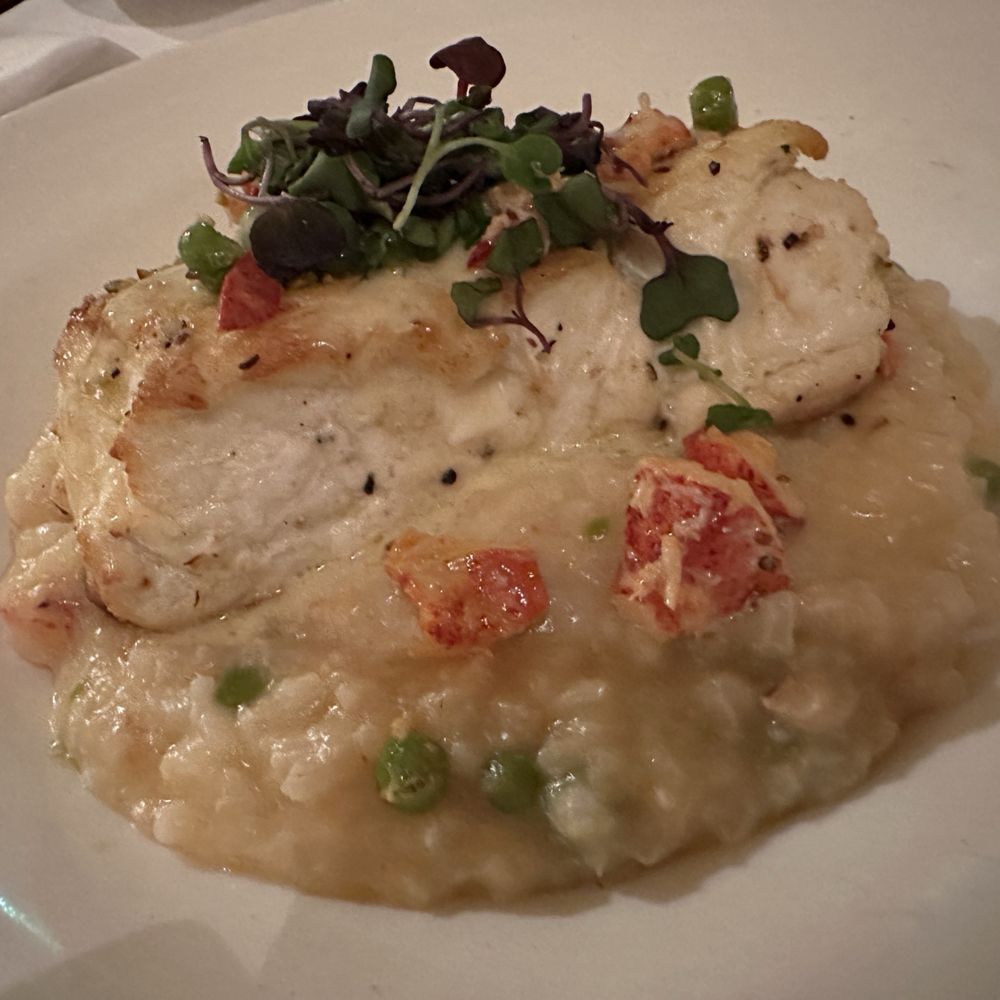 Muse Restaurant & Wine Bar - Halibut with crab risotto - Italian Near Me - Charleston, South Carolina Muse Restaurant & Wine Bar - Halibut with crab risotto - Italian Near Me - Charleston, South Carolina