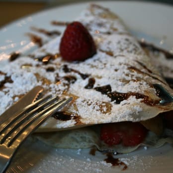 La Petite Crepe - a plate of food with a fork - Creperies Near Me - Vancouver, British Columbia La Petite Crepe - a plate of food with a fork - Creperies Near Me - Vancouver, British Columbia
