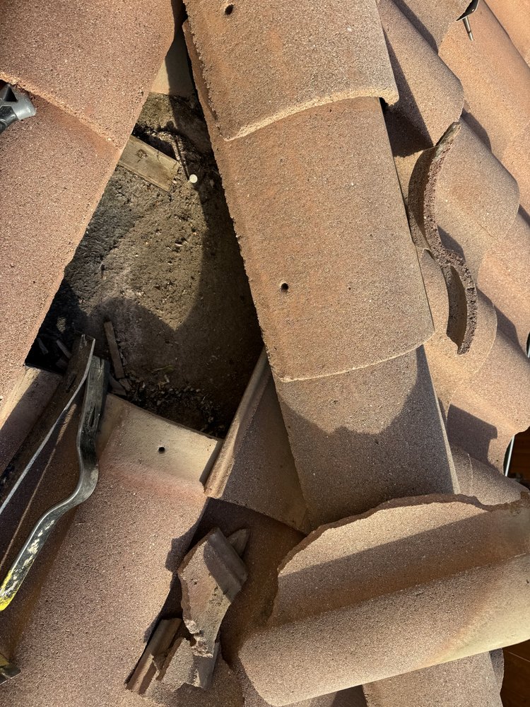 Slide of LXS Roofing