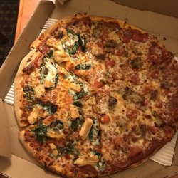 Domino's Pizza - This Brooklyn style pizza only cost me $7.99. It was the most glorious meal I've had here in Macomb. I ordered inside the store. Amazing!!!!
