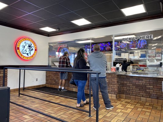 Photo of Birrieria Guadalajara - Santa Ana, CA, US. a man and a woman standing in front of a restaurant