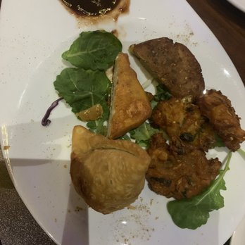 Tandoori Bites - Vegetable Sampler: Veg Pakora, Samosa, Aloo Tikka and Cheese Pakora. The Aloo and cheese were my favorites. - Indian Near Me - Durham, North Carolina Tandoori Bites - Vegetable Sampler: Veg Pakora, Samosa, Aloo Tikka and Cheese Pakora. The Aloo and cheese were my favorites. - Indian Near Me - Durham, North Carolina