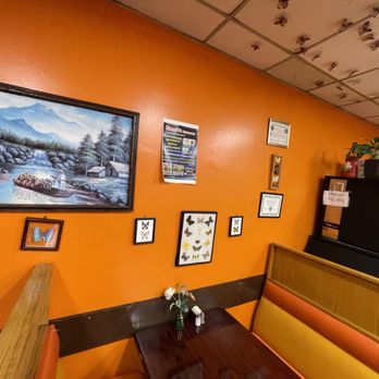 Monarca's Mexican Food - a dining area with orange walls - Mexican Near Me - Harbor City, California Monarca's Mexican Food - a dining area with orange walls - Mexican Near Me - Harbor City, California