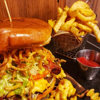 Guy Fieri's Branson Kitchen + Bar - Bacon mac & cheese burger. - Bars Near Me - Branson, Missouri Guy Fieri's Branson Kitchen + Bar - Bacon mac & cheese burger. - Bars Near Me - Branson, Missouri
