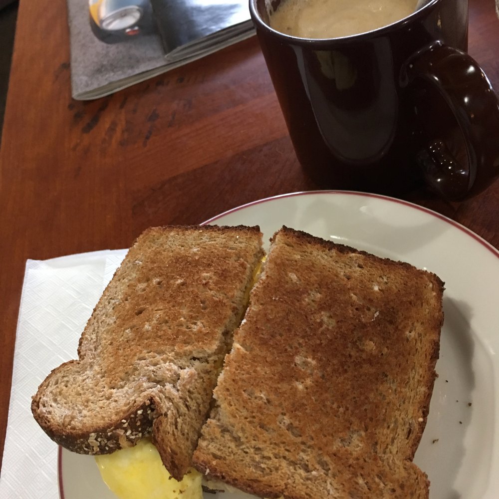 Gizzi's Coffee - The usual.. sausage, egg & cheese on toasted wheat toast with a latte - Sandwiches Near Me - Delray Beach, Florida