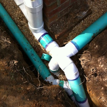 Vortex Drainage Systems - The junction where all downspout pipes are connected. The water is then piped to the street. - Waterproofing Near Me - Durham, North Carolina