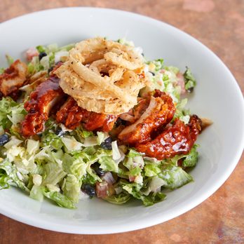Secret Sauce - a salad with onion rings on top - Southern Near Me Secret Sauce - a salad with onion rings on top - Southern Near Me