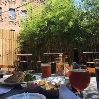 Audubon Boston - Left to right:  Turkey Cubano Sandwich, San Diego Fish Taco, Shrimp Taco, Amber Ale, Orval - American Near Me - Boston, Massachusetts