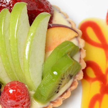 Pasadena Baking - a plate of fruit and a pastry - Bakeries Near Me
