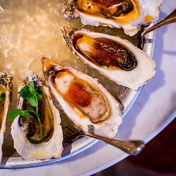 Wright Brothers - Soho - oysters dressed with Chilli jam - Seafood Near Me - London, XGL Wright Brothers - Soho - oysters dressed with Chilli jam - Seafood Near Me - London, XGL