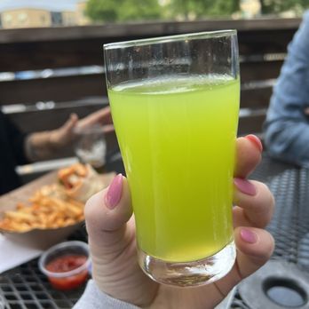 Eagle Park Brewing - a person holding a glass of beer - Breweries Near Me - Milwaukee, Wisconsin