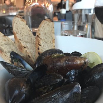 Answer - The mussels have a uniquely spicy kick to 'em. You've never had mussels like these before! - Tapas/Small Plates Near Me - Nashville, Tennessee