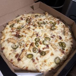 Chicken Alfredo with onions and jalapeños