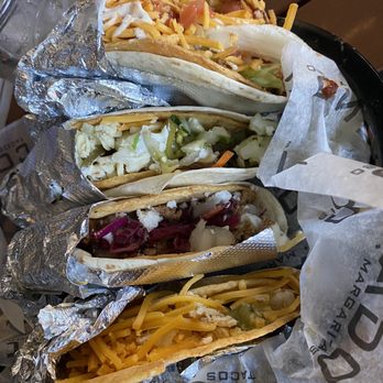 Condado Tacos - (Bottom to top) Chicken plain Jane, purple haze, cali green and the heater - Tacos Near Me - Mount Pleasant, South Carolina