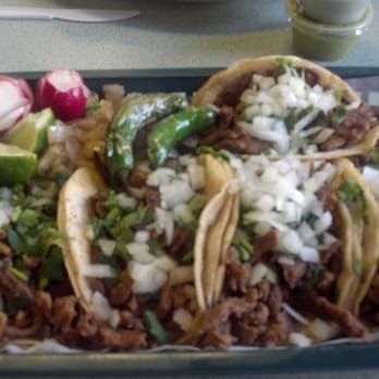 Leo's Restaurant - a tray full of tacos - Mexican Near Me - Elkhart, Indiana Leo's Restaurant - a tray full of tacos - Mexican Near Me - Elkhart, Indiana