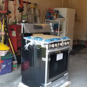 Lowe's Home Improvement - Uninstalled new stove in garage - Hardware Stores Near Me - Mentor, Ohio