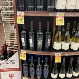 a display of wine bottles in a store
