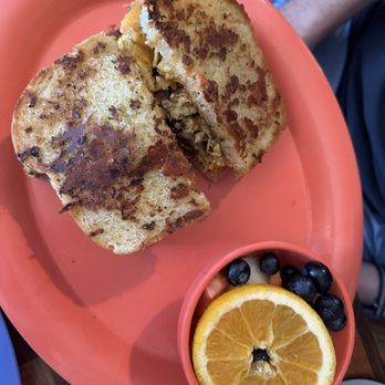 Squeeze In - Garth Breakfast Sandwich with Fruit - Breakfast & Brunch Near Me - Truckee, California Squeeze In - Garth Breakfast Sandwich with Fruit - Breakfast & Brunch Near Me - Truckee, California
