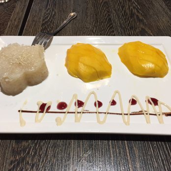 Elephant Jumps - Mango Sticky Rice, w/ a side drizzle of chocolate, raspberry and vanilla sauces - Thai Near Me - Falls Church, Virginia