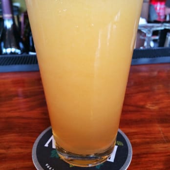 Elysian Brewing - Capitol Hill - Nitro served Superfuzz! Notice the creamy head and small bubbles. - Brewpubs Near Me - Seattle, Washington