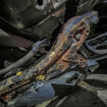 Jeffreys Auto Resale - significantly rust damaged suspension system injected with expanding foam - Used Car Dealers Near Me - Clinton Township, Michigan