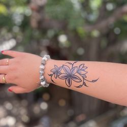 Henna Happens - Freestyle plumeria wrist design