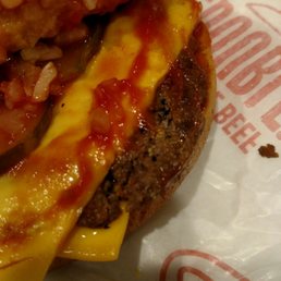 Only one beef patty on a "double cheeseburger"