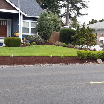 PC Landscape Services - a truck parked in front of a house - Landscaping Near Me PC Landscape Services - a truck parked in front of a house - Landscaping Near Me
