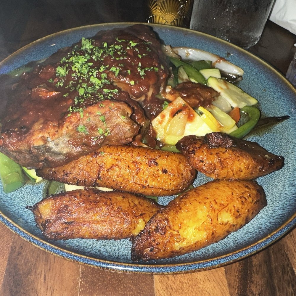 Bacchanal Junction - Stewed King Fish with Vegetables & Plantains. - Bars Near Me - Bloomfield, New Jersey Bacchanal Junction - Stewed King Fish with Vegetables & Plantains. - Bars Near Me - Bloomfield, New Jersey