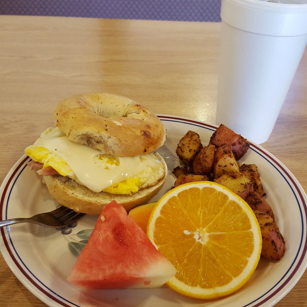 Bageland Thornebrook - W/coffee, soda or iced tea, $6.04 including tax-- brought to ur table. Can get w/ ham, bacon or sausage - Bagels Near Me - Gainesville, Florida