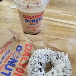 Stoks coffee and a coconut chocolate donut