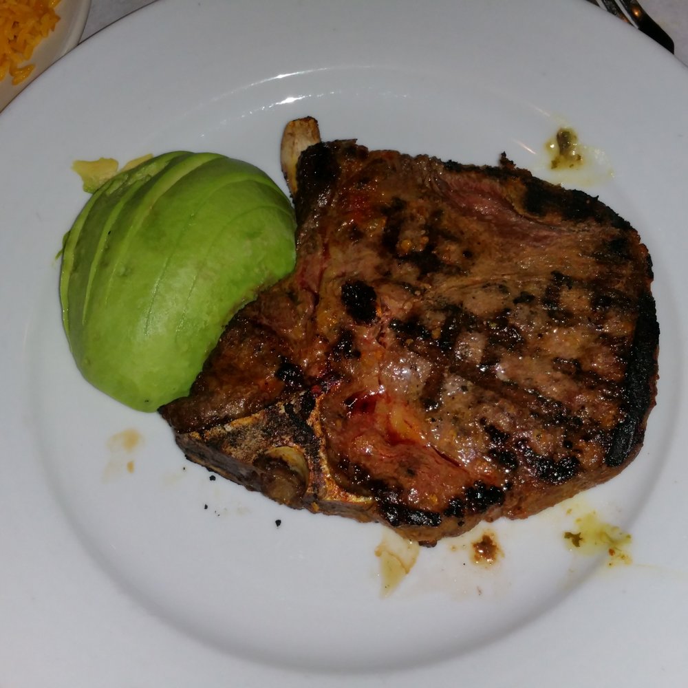 Cinco de Mayo - T-Bone Steak (A-): A T-bone at a Spanish restaurant? I wouldn't have believed it. Obviously marinated to softness and cooked expertly. - Mexican Near Me - Bayside, New York Cinco de Mayo - T-Bone Steak (A-): A T-bone at a Spanish restaurant? I wouldn't have believed it. Obviously marinated to softness and cooked expertly. - Mexican Near Me - Bayside, New York